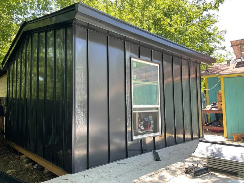 Black standing seam metal wall panels for Roof Inspection in Louisville