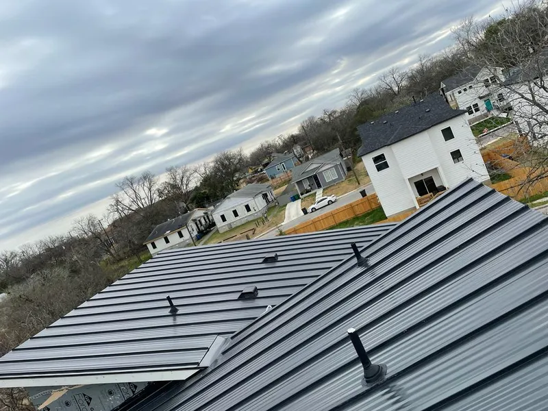 Standing seam metal roof panels with vents for Skylight Repair in Louisville